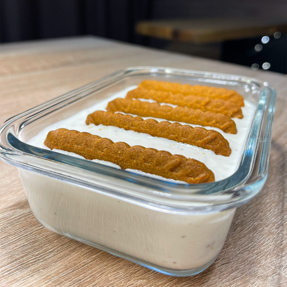 Close-up photo of High-Protein Japanese Yogurt Cheesecake (Viral Biscoff Recipe) served in a glass container