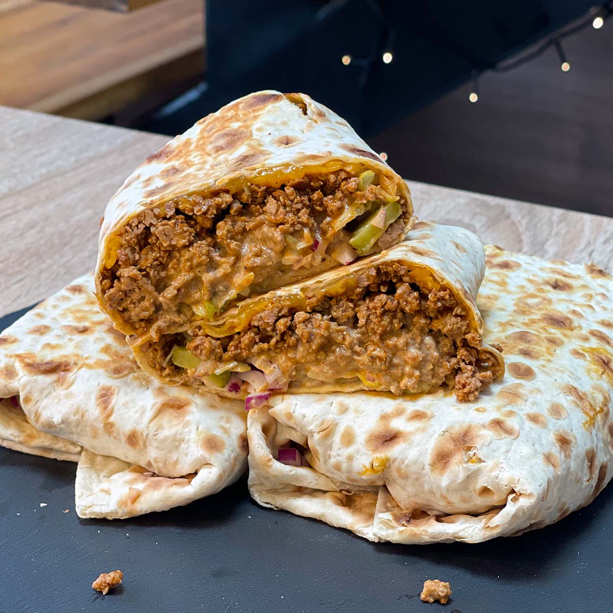 Close-up photo of High-Protein Big Mac Wrap served on a stone plate