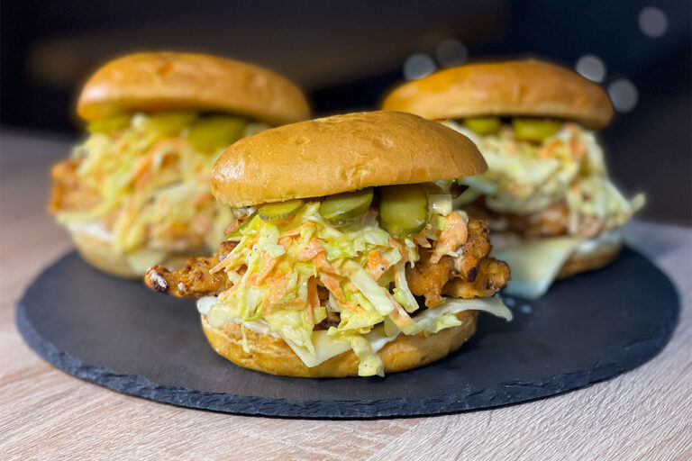 3 Chicken Coleslaw Sandwiches (High-Protein Burger) served on a stone plate
